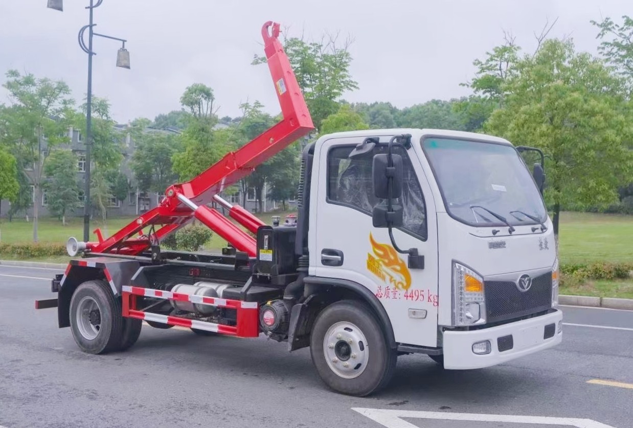 重汽豪曼蓝牌(地库)勾臂垃圾车 7方建筑垃圾箱  